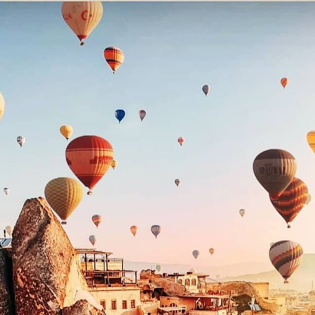 What a beautiful morning in Cappadocia... Balloons sailing over the golden-lit ridges 🌅